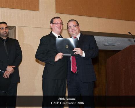 Nilson Feliz, MD (2016 graduate) receiving his graduation certificate from Roberto L. Collazo-Maldonado M.D. FACP (Program Director)